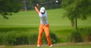 Picture of a scratch golfer teeing off